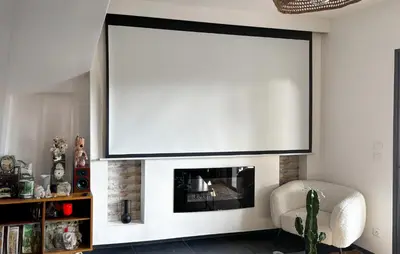 a living room with a tv above a fireplace at 3 Bedroom Amazing Home In Montfavet in Montfavet