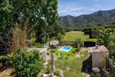 an aerial view of a garden with a tiny house at Errances Provençales in Saint-Rémy-de-Provence