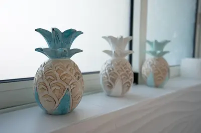 a group of vases sitting on a counter in front of a mirror at Lovina chambre de charme avec jacuzzi in Velaux