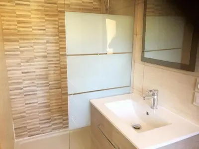 a bathroom with a sink and a shower at Le domaine de Gaïa in Aix-en-Provence