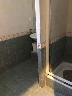 a bathroom with a tub and a toilet and a sink at House quiet and wooded in Aix-en-Provence
