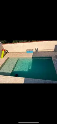 a pool of water with a toy in it at Haut de villa avec piscine privée et extérieur in Lançon-Provence