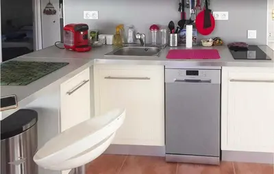 a kitchen with a sink and a dishwasher at 3 Bedroom Cozy Home In Meyrargues in Meyrargues