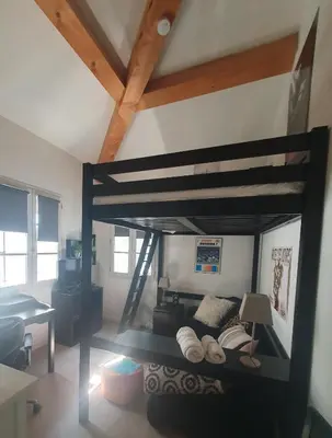 a bedroom with a bunk bed in a room with a desk at Lou Pantai, House, 5 bedrooms, 8 people, AC, Pool, Large garden,4km from AIX EN PROVENCE in Aix-en-Provence