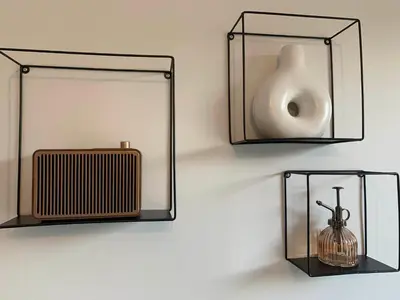 a wall with two mirrors and a radiator and a urinal at Le Cabanon de Livia avec piscine privée in Cucuron