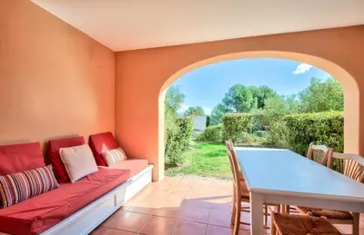 a living room with a couch and a table at Village Pont Royal en Provence - maeva Home - Appartement cosy et climatisé 2 pièces 5 personnes avec jardin - Prestige - super Home MAE-2864 in Mallemort