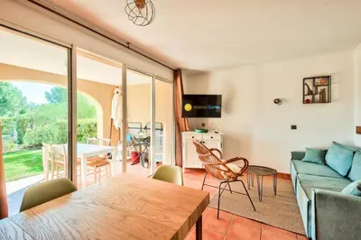 a living room with a couch and a table at Village Pont Royal en Provence - maeva Home - Appartement cosy et climatisé 2 pièces 5 personnes avec jardin - Prestige - super Home MAE-2864 in Mallemort