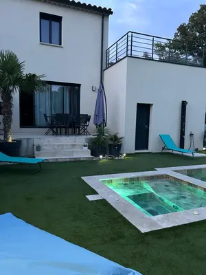 a house with a swimming pool in the yard at Luxury House Family’s in Carpentras