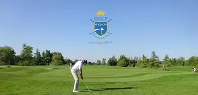 a man is playing golf on a golf course at Chez Fleur in Avignon