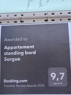 a sign that sayspared to appointment standing boardvenue at Appartement standing bord Sorgue in LʼIsle-sur-la-Sorgue