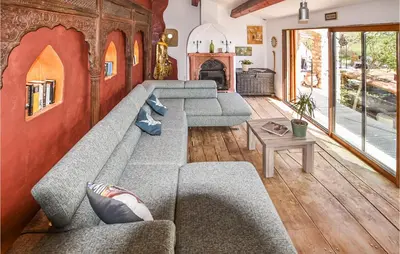 a living room with couches and a fireplace at Gorgeous Home In Sault in Sault-de-Vaucluse